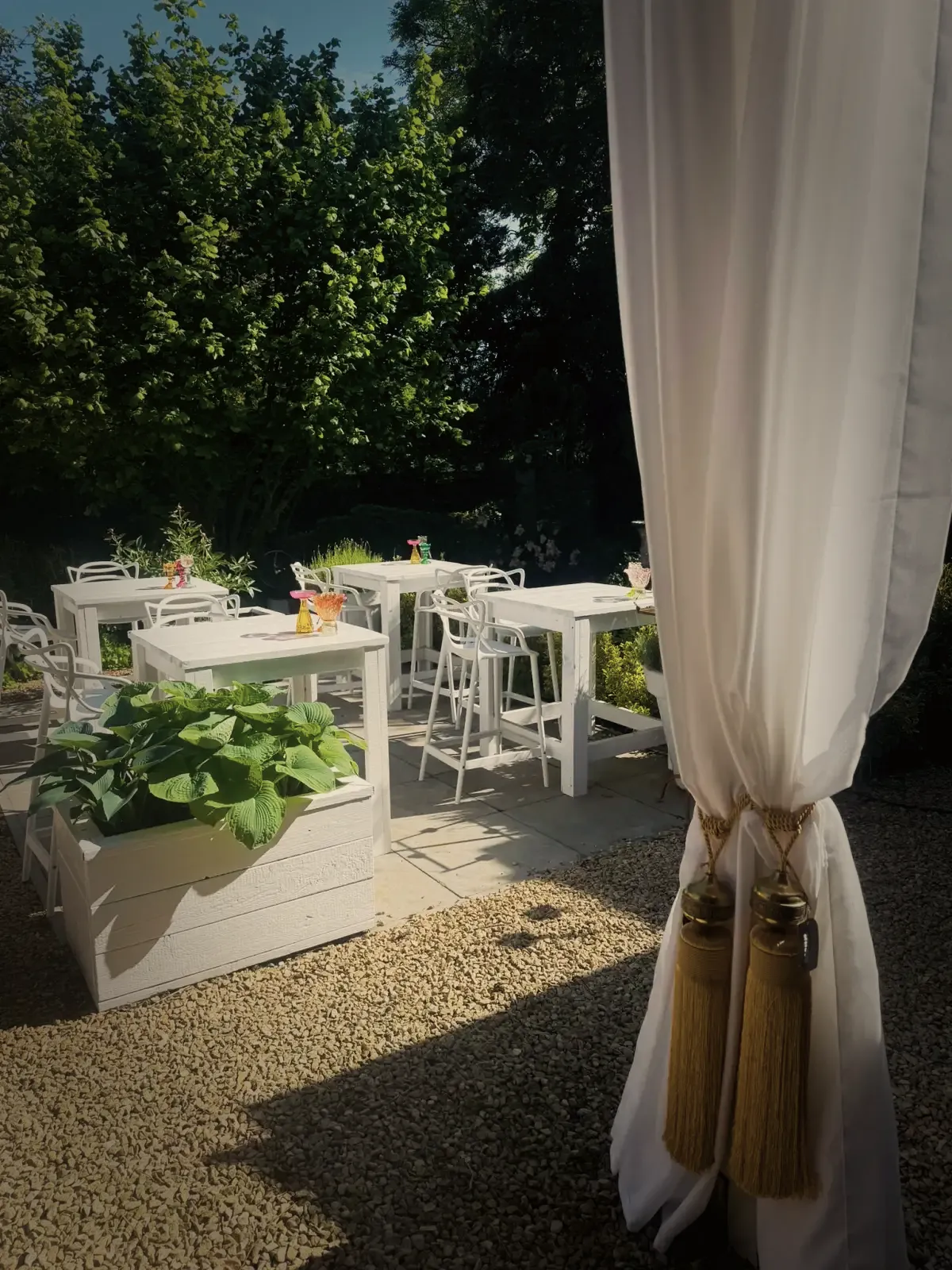 Het terras achteraan